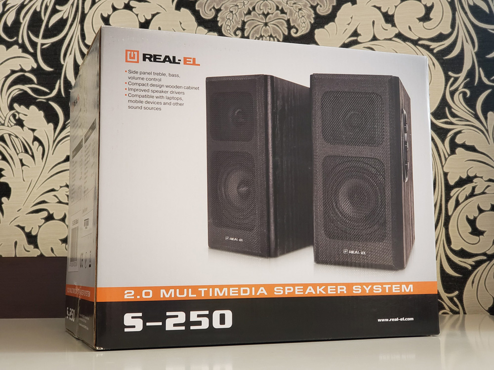 Фото упаковки колонок REAL-EL S-250